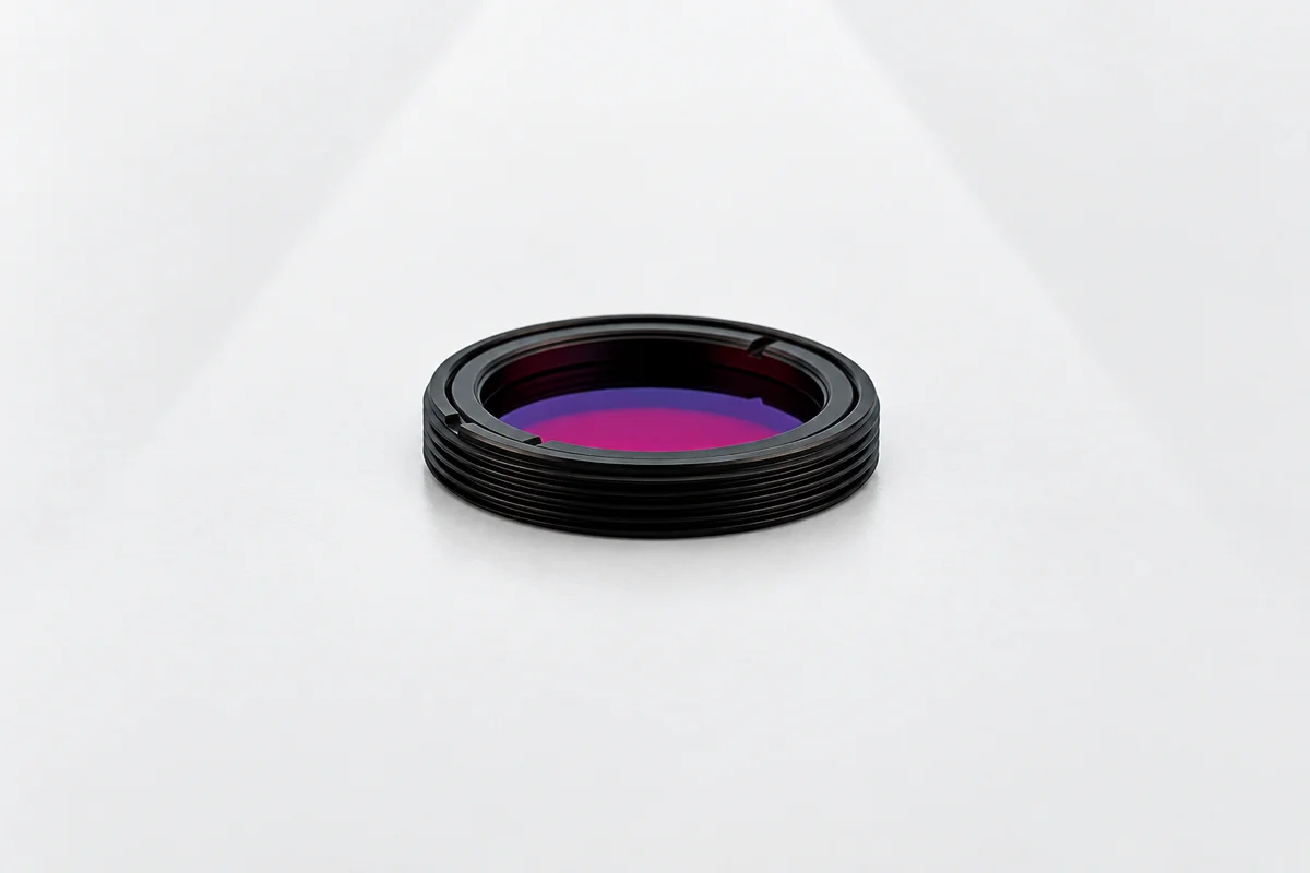 Visible bandpass filter in a black threaded mount